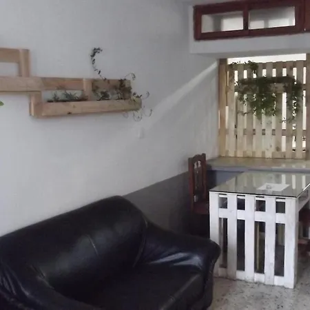 Проживание в семье Casa En La Ola *