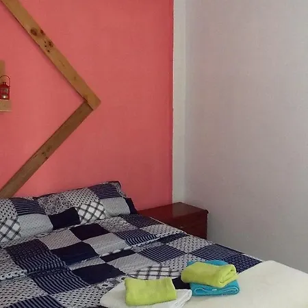 Проживание в семье Casa En La Ola *